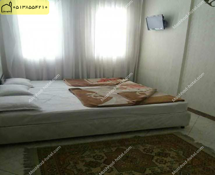 اتاق 4 تخته (1 تخت دبل و 2 تخت سینگل)